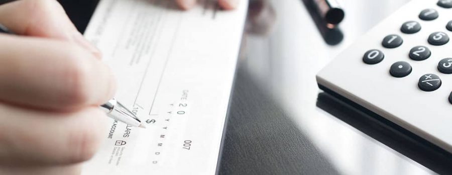 Business woman prepare writing a check